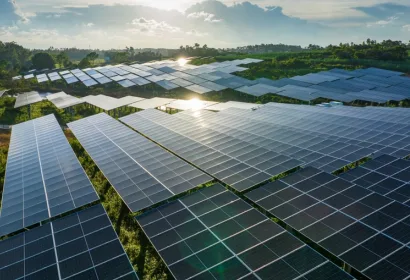Large solar farm panels under open sky